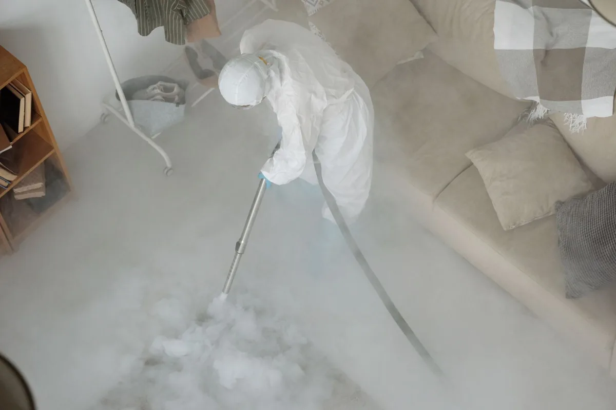 Biohazard cleanup technician in protective equipment, New Britain, CT